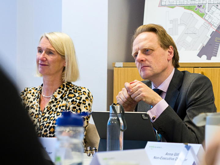 Matthew Winn and Lynda Thomas in board room